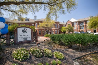 The Enclave at La Frontera entrance sign Round Rock apartments