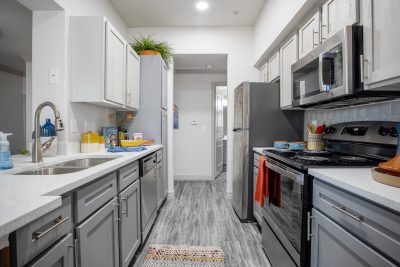 Contemporary kitchen with gray cabinets Round Rock apartments
