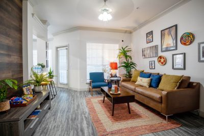 Open-concept living room at The Enclave at La Frontera apartments