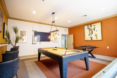 Clubhouse billiards and game room at The Enclave at La Frontera Round Rock