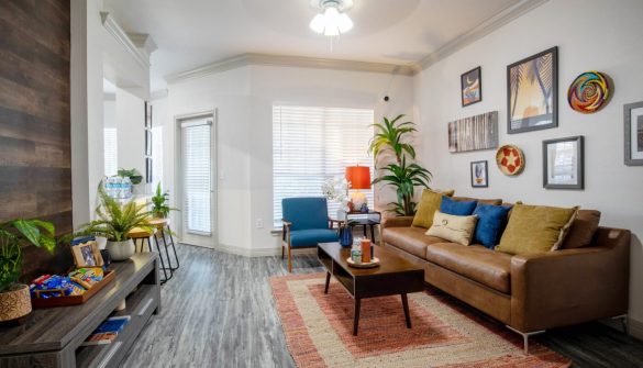 Open-concept living room at The Enclave at La Frontera apartments